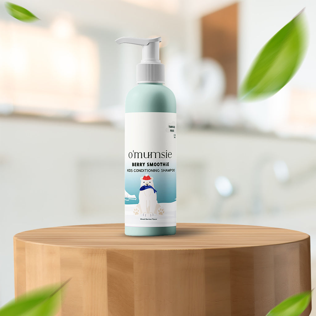 Shampoo bottle labeled 'omumsie' on a wooden surface 