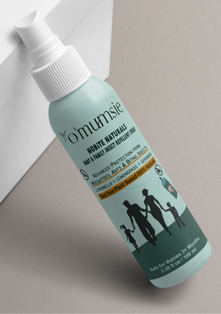 Mumsie natural insect repellent spray bottle on a neutral background